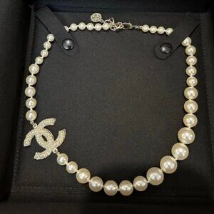 CHANEL White Pearl Necklace with Crystal Logo